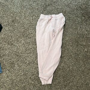 Light pink lululemon joggers. Size 4.
